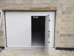 Pose d'une porte de garage sectionnelle